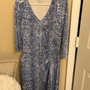 Spanner faux wrap blue and white animal print dress.